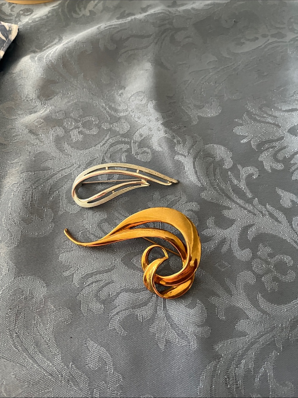 Elegant Gold Brooch/pin-Swirl Accent marked Avon-Silver brooch mark Sara Coventr
